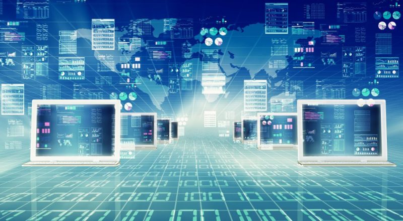 Website Design - Multiple computer screens with a "technological" background