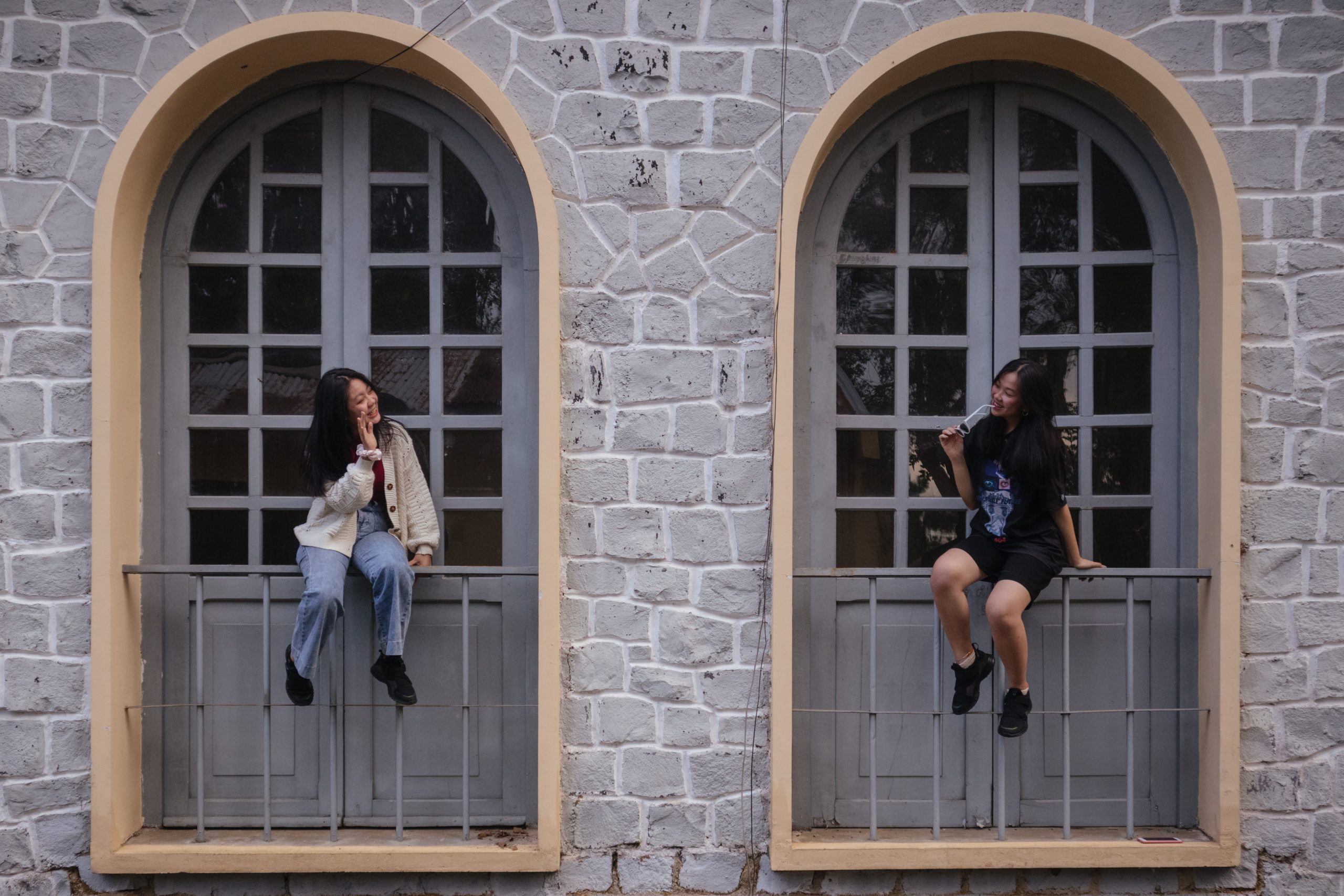 To women talking to each other on the phone