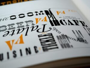 A collection of various fonts competing on the page of a book, illustrating the power of typography/